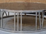 a round table with a glass top in a room