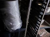 an image of a metal rack with a bag on it