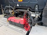 a train engine with a red box underneath it