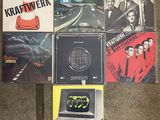a lot of cd ' s that are on the floor