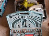 a blue tool box with tools in it on the floor
