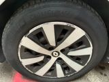 a close up of a tire on a car ' s rim