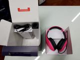 a box with a pair of headphones inside of it