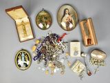 a lot of religious items that are on the table