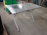 a table that is sitting in the middle of a room
