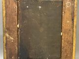 a close up of a wooden frame with a chalkboard in it