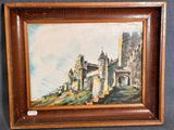 une peinture à l'huile représentant un château, dans un cadre en bois sur fond noir