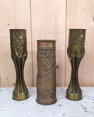 three vases that are sitting on a table