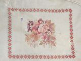a picture of a picture of flowers on a table cloth