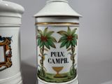 two ceramic containers that are sitting next to each other