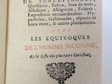 an open book with a picture of a bird on it ' s cover
