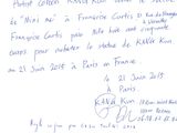 a handwritten letter written in french on a piece of paper