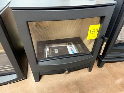 two microwaves that are sitting next to each other on the floor