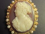 a picture of a picture of a lady with pearls in her hair