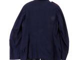 the back of a blue jacket with a red stripe on it