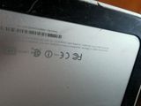 a close up of a laptop with a bar code on it