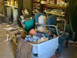 an image of a room with a lot of clutter in it