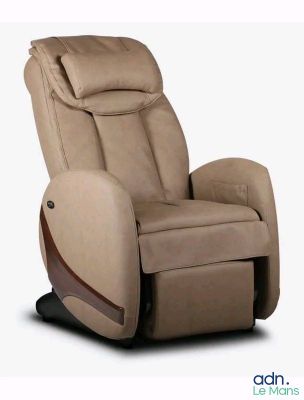 a brown recliner chair sitting on top of a white background
