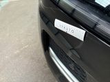 a close up of a car with a sticker on the front of it