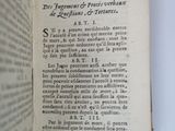 an open book with a black and white title on it