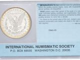 an image of a silver coin with a label on it