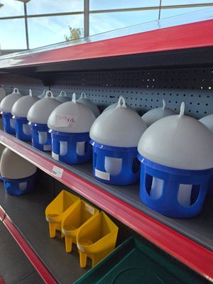 many plastic containers on the shelves in the store