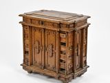 une vieille armoire en bois avec des tiroirs et des portes, sur fond blanc