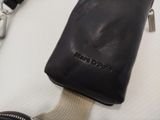 a small black bag with a zipper on it