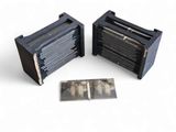 an old photo of a couple of old photos in a box