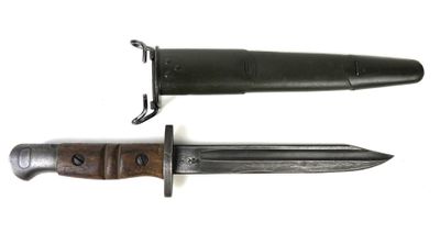 an image of a knife with a wooden handle on a white background