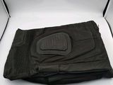 an image of a pair of black pants sitting on top of a white table