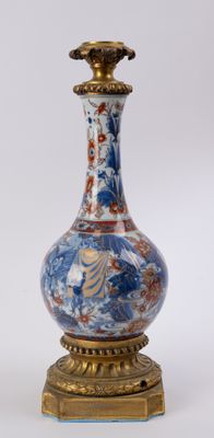 pair of vases with blue and red designs on them on a white background