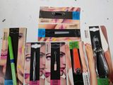a lot of different makeup products on the table