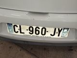 a close up of a license plate on a car