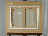 a picture of an easel with a painting on it