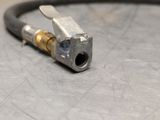 a close up of a hose on a table