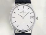 an image of a close up of a watch on a white surface