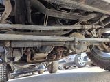 a close up view of a vehicle ' s front suspension