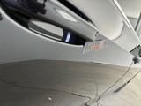 a close up of a car ' s rear end with a sticker on it