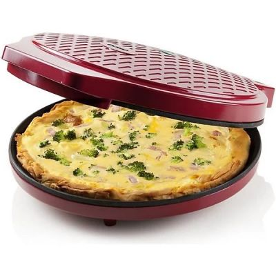 a pizza in a pan with broccoli on it