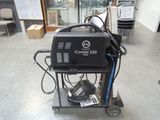a machine that is sitting on a cart in a room
