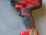 a cordless drill that is sitting on the floor