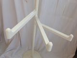 a picture of a white wooden display stand with four arms