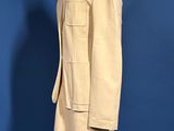 an image of a beige suit on a mannequin mannequin stand