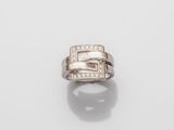 an 18k white gold and diamond ring