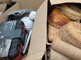 a cardboard box filled with assorted items in a warehouse