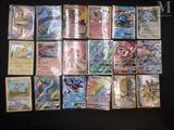 many different types of pokemon cards on the table