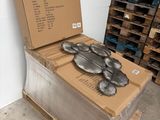 a cardboard box with a metal object on top of it