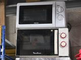 a microwave and a toaster sitting on a shelf in a warehouse