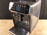 an image of a coffee machine on a wooden table